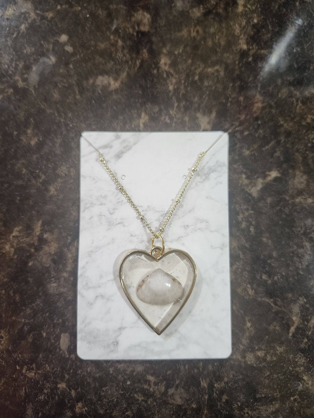 Gold Heart Pendant Necklace with A Seashell In A Clear Resin Center